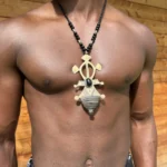 Collier touareg en argent, croix d'Agadez à cabochon noir et cône, artisanat saharien